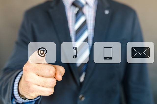 finger pressing email icon