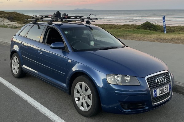 Audi A3 next to beach