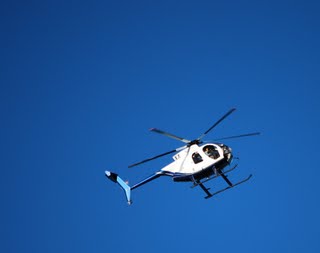 Helicopter in blue sky